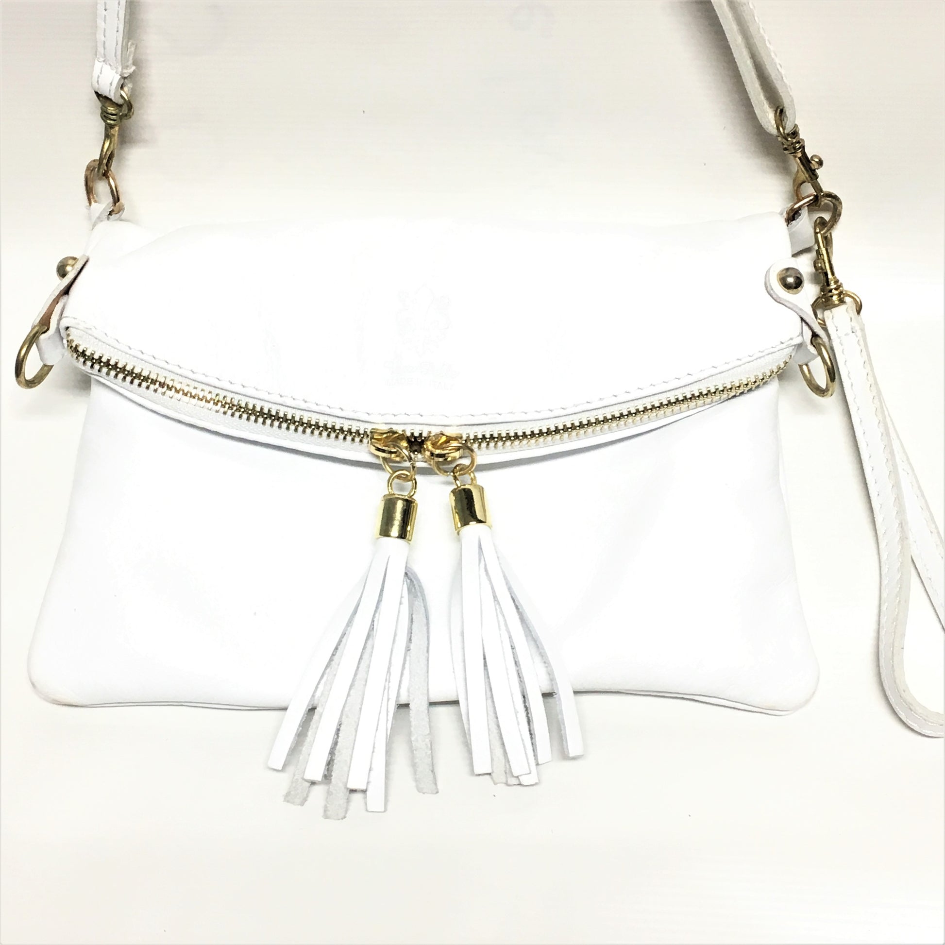 white handbag with white tassels, leather handbag with white tassels
