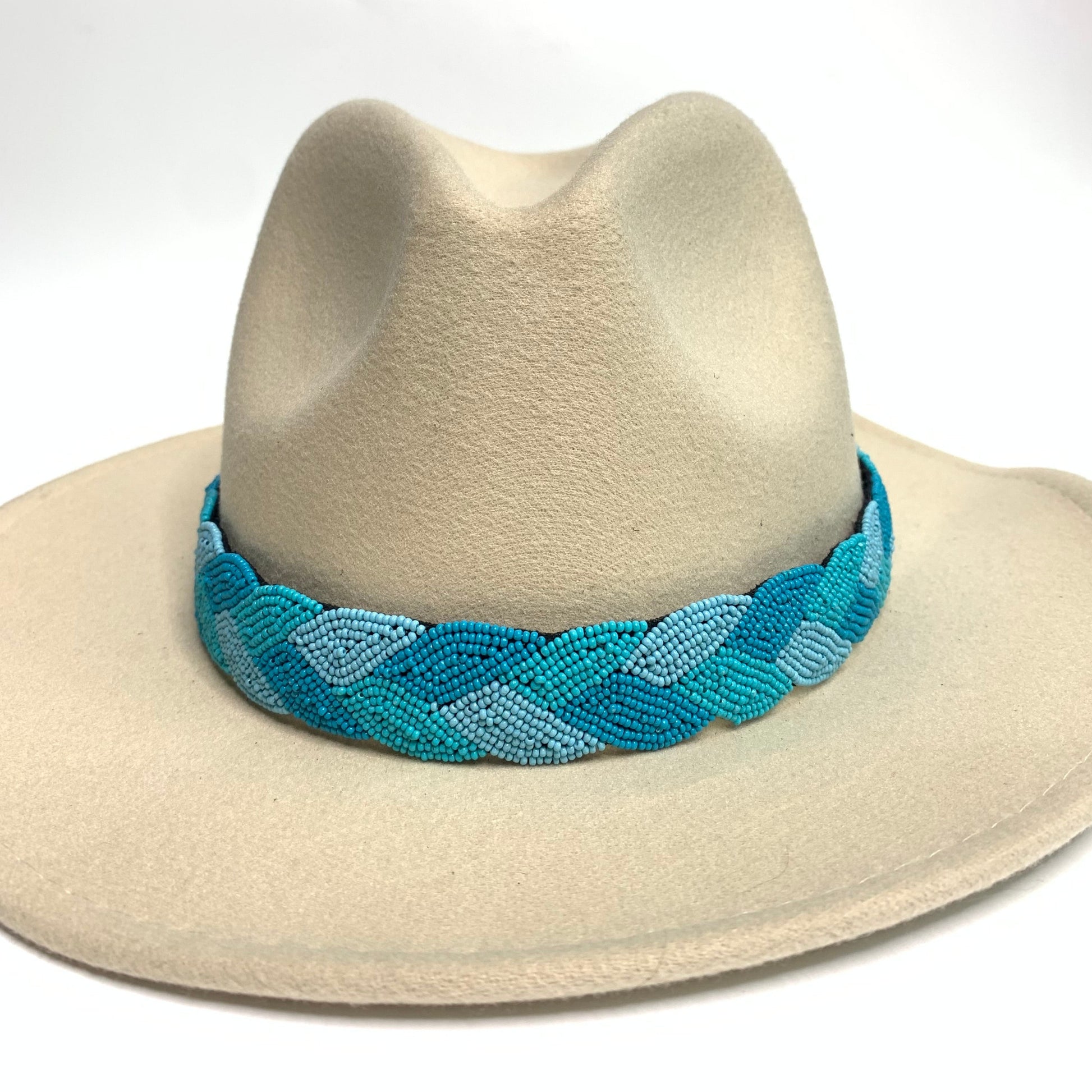 adjustable beaded hatband with three varying shades of turquoise