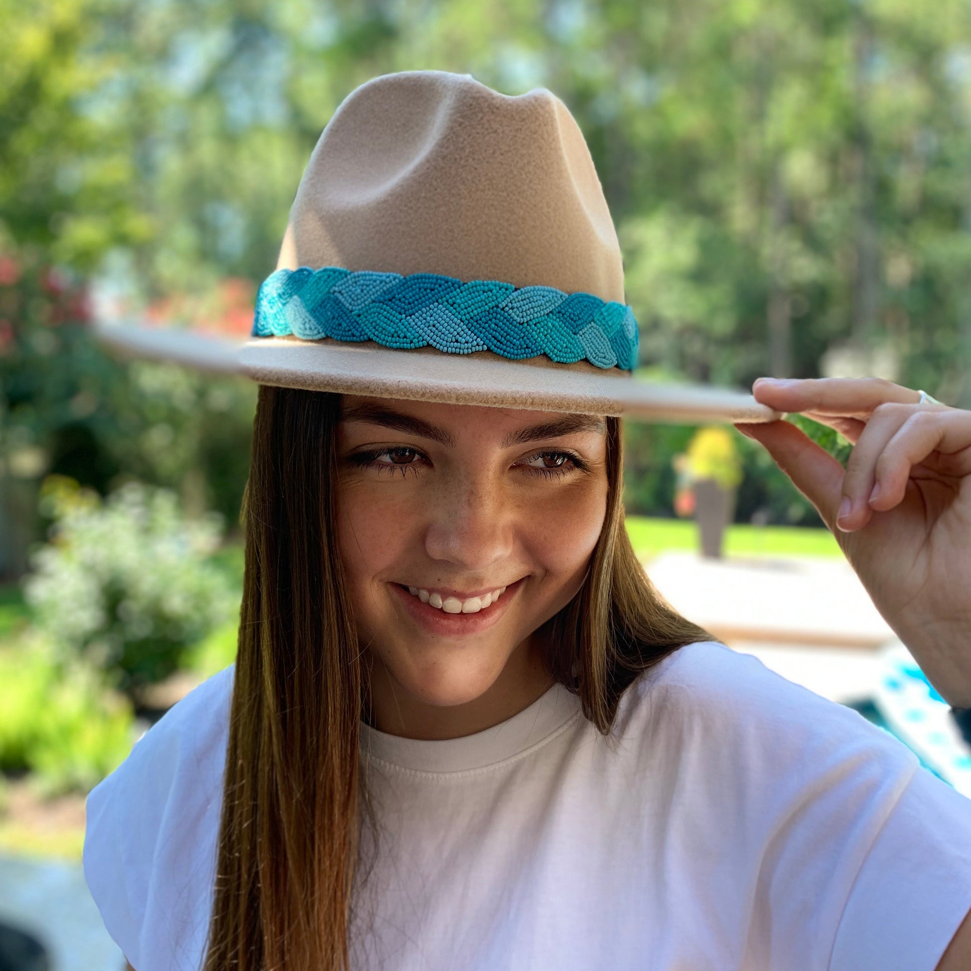 adjustable headband with duo toned turquoise beads in a braided pattern