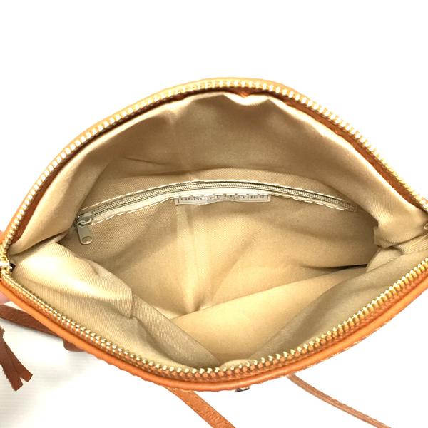 Inside zipper pocket of soft leather purse