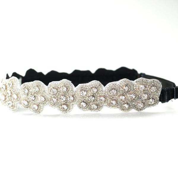 Floral bridal headband made with crystals and an adjustable elastic strap